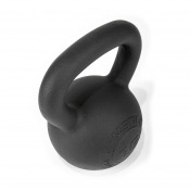 Detaljbild på kettlebell i svart gjutjärn sedd ovanifrån med handtagets form.
