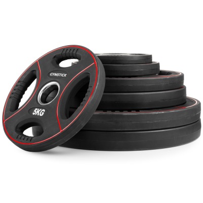 Pro PU Weight Plate viktskivor i svart med grepphål, staplade med en skiva lutad framåt.