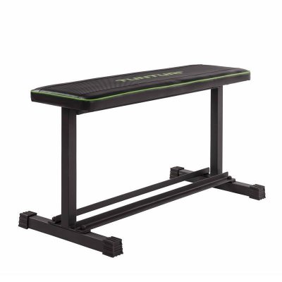 Tunturi FB20 Flat Bench platt träningsbänk med svart stålram och vadderad dyna, sedd från sidan.